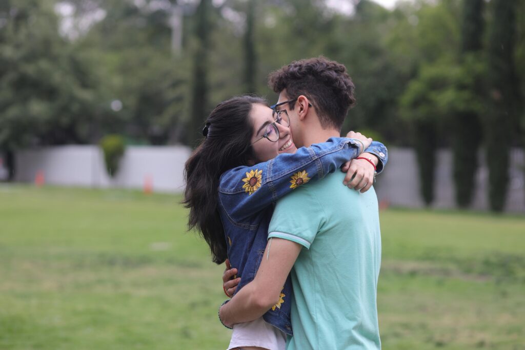 It captures a warm, genuine moment that reflects comfort, connection, and the excitement of meeting in person—ideal for the theme of transitioning from online to real-life dating.
